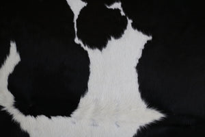 Black and White cowhide rug. Code 96073.