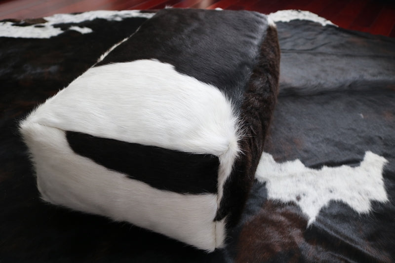 30' Black and white cowhide pouf. Code 97023.