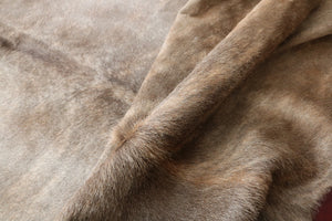 Brown cowhide rug. Code 95239.