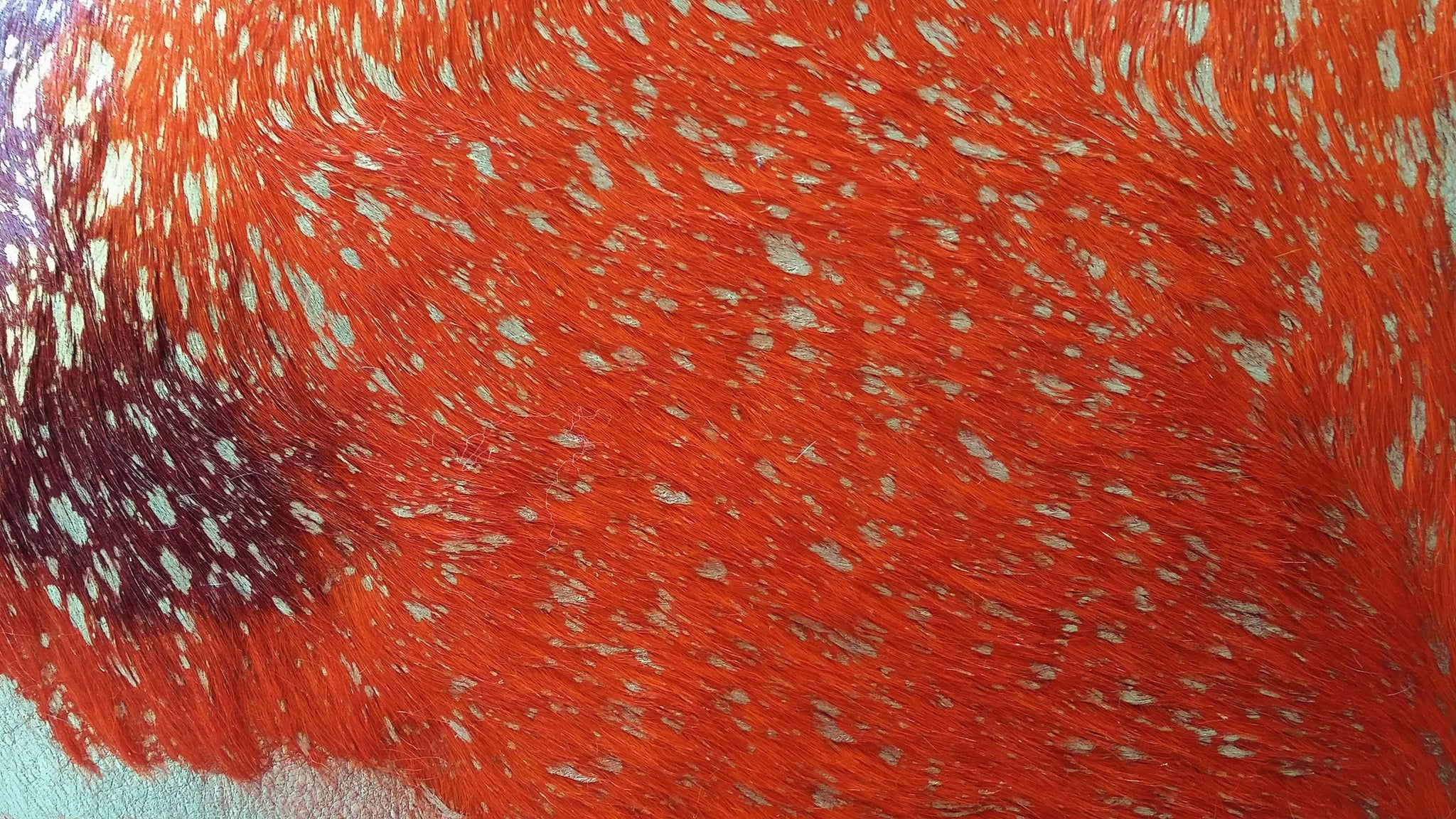 77101 Acid Wash Orange and Golden cowhide pillows.