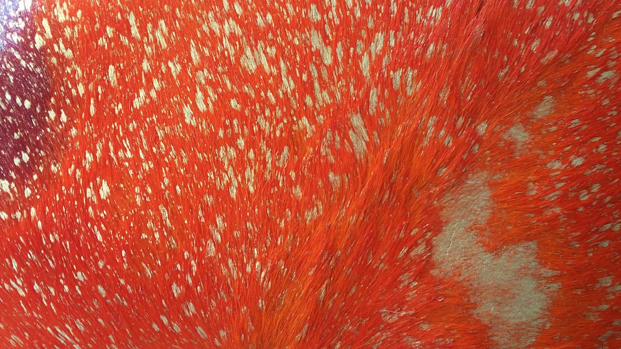 77101 Acid Wash Orange and Golden cowhide pillows.