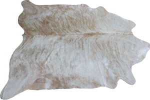 Beige and white cowhide rug. Code 96169.