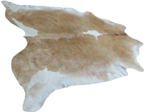 Brown and white cowhide rug. Code 96134.