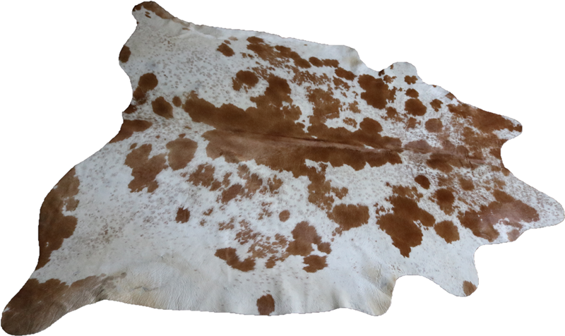 Brown and white cowhide rug. Code 96096.