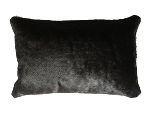 77102. Black cowhide pillow.
