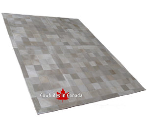 Cowhide patchwork rug Ivory and white. Code 98214.