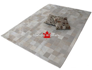 Cowhide patchwork rug Ivory and white. Code 98214.