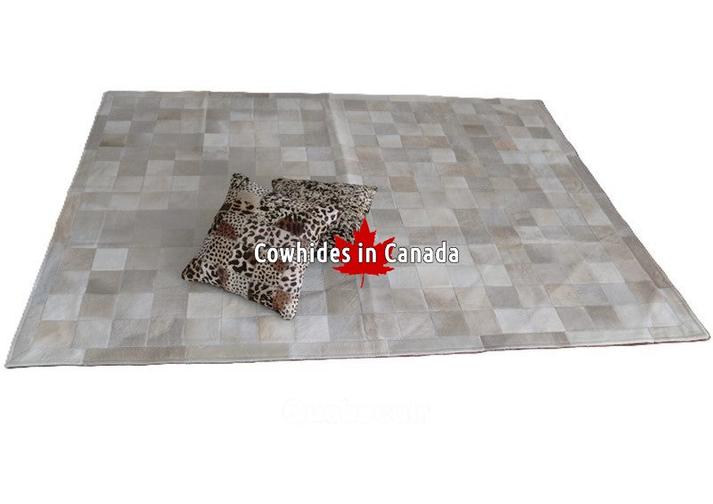 Cowhide patchwork rug Ivory and white. Code 98214.