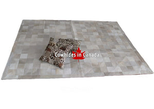 Cowhide patchwork rug Ivory and white. Code 98214.