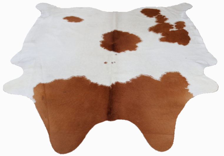 Brown Caramel and white cowhide rug. Code 95372