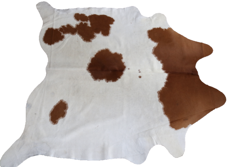 Brown Caramel and white cowhide rug. Code 95372