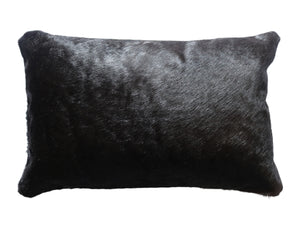 77102. Black cowhide pillow.