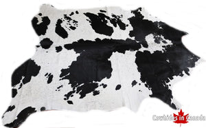 Black and white cowhide rug