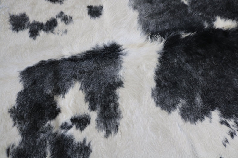 Long hair gray and white cowhide rug. Code 66104.