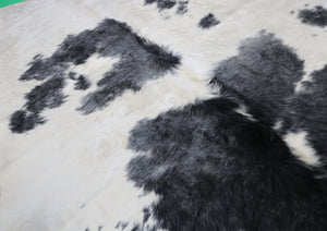 Long hair gray and white cowhide rug. Code 66104.