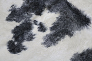 Long hair gray and white cowhide rug. Code 66104.