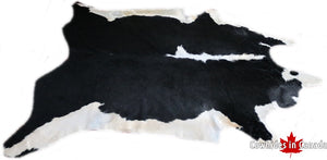 Big black and white cowhide rug